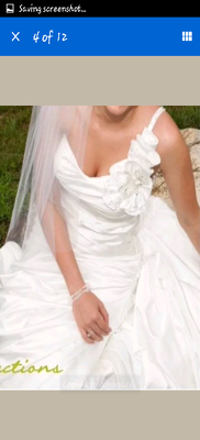 Owner modeling the dress