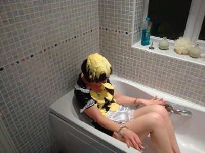 Who's this sexy satin maid ?