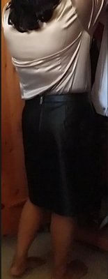 My good lady in her brown satin blouse and leather skirt....