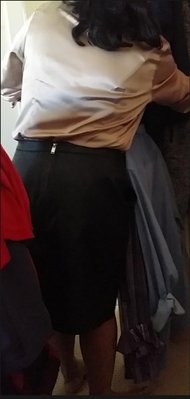 My good lady getting ready to wear the next office blouse....