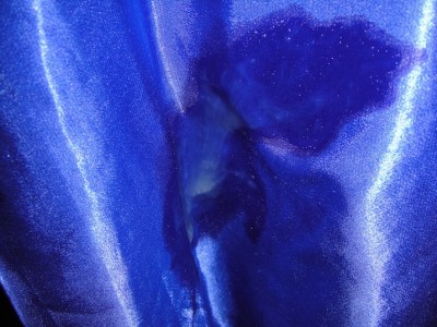another view of blue satin skirt with cum
