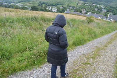 Hood up due to light drizzle in the air.