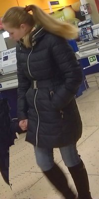 Fully belted and fastened showing off her shape well, I want her bad !