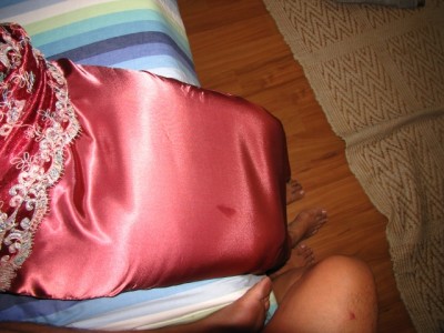 Before : dress lifted up to reveal shiny satin skirt