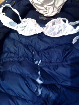 Wanky fun with her coat and sexy undies.