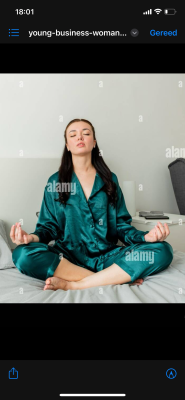 Again loving those bare feet under her satin jammies
