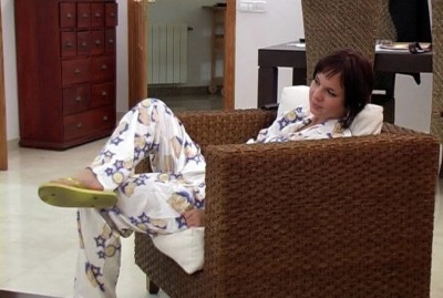 Girl is watching porn in her satin pajamas