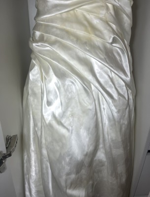 Splattering all over the front of her wedding dress