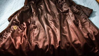 The most luxurious mink coat with a copper coloured super soft smooth glossy satin. Lighter weight fur with beautiful detail and musky aroma- too gorgeous to cum on.