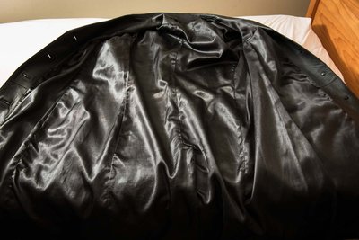 A newer polyester satin lining- still slippery smooth